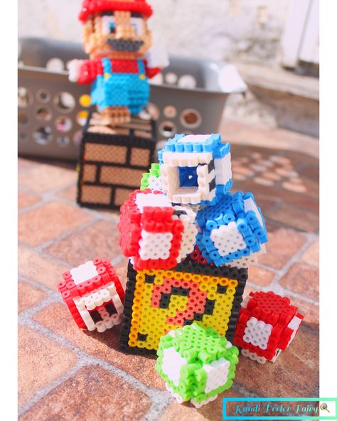 Super Mario Perler beads 3D mushroom 3d Kirby Perler Beads, Rainbow Mushroom Perler Beads, 3d Perler Bead Patterns Mario, 3d Mario Perler Beads, Perler Beads Mario Cart, Perler Bead Mario Mushroom, Hama Beads 3d, Perler Bead Mario, Super Mario 3d