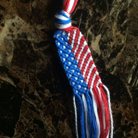 Sweet American flag pattern! Great for Fourth of July! Red White And Blue String Bracelet, Fourth Of July Bracelet Ideas String, Red White And Blue Friendship Bracelet Pattern, Fourth Of July Bracelet Patterns, 4th July Braclets, Fourth Of July String Bracelets, 4th Of July Bracelets String, Patriotic Friendship Bracelet Patterns, Usa Bracelet Pattern