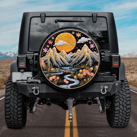 This spare tire cover with printed embroidery effect, featuring beautiful mountain landscape will protect your expensive spare tire against sun, wind, dust and water! And it will add a personal touch to the exterior of your car as well! Available with backup camera hole, or without it. NOTE. This is printed effect, the cover is not embroidered. The sides of the cover are black. Our spare tire covers are compatible with Jeep, with Bronco, with Toyota, as well as campers, RVs and trailers. See all Bronco Tire Cover, Jeep Spare Tire Covers, Jeep Art, Jeep Things, Jeep Tire Cover, Custom Jeep Wrangler, Cars Jeep, Tiny Camper, Car Things