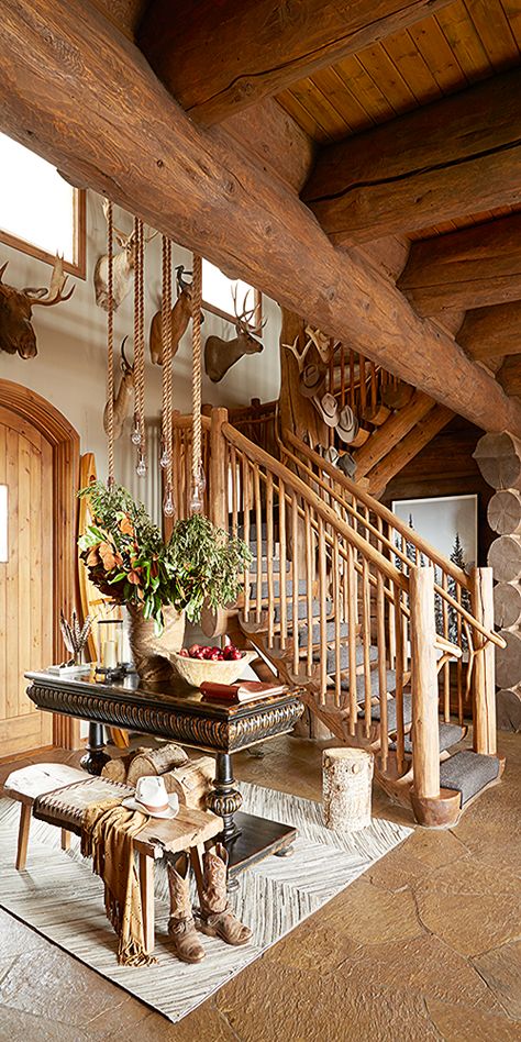 Enchanted by her Colorado ranch’s mountain backdrop and surrounding forests, designer Kirsten Norman used creamy colors and luxurious textiles to compliment the home’s log staircase. Rustic Staircase, California Beach House, Colorado Ranch, Staircase Runner, Lacquered Walls, Elegant Entryway, Montana Ranch, Entry Furniture, Wood Staircase