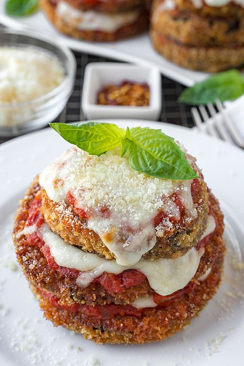 This cozy and comforting eggplant parmesan is fried until golden and crispy, topped with marinara sauce and cheese, then baked to melted perfection! | thecozyapron.com #eggplantparmesan #eggplantparmesanhealthy #eggplantparmesaneasy #eggplantparmesanrecipes Eggplant Parm Stacks, Eggplant Parmesan Stacks, Stacked Eggplant Parmesan, Eggplant Stacks Baked, Eggplant Napoleon Recipe, Eggplant Napoleon, Crispy Eggplant Parmesan, Pasta Eggplant, Eggplant Parmesan Easy