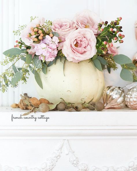 Roses & pumpkins mingling together... because- why not? I carved a couple pretty white pumpkins for creating an autumn inspired bouquet a few years ago- and filled them with go with my favorite muted palette. Pale roses & silvery sage eucalyptus are always on repeat. Will share where this #tbt pumpkin landed back then and this years version soon. Getting ready for Round Top, Texas and the book signings at Blue Hills and Old Glory tomorrow. Details on my blog. Hope to see you there! #pumpkin #... Courtney Allison, Pumpkin Bouquet, Pumpkin Floral Arrangements, Pink Thanksgiving, Pumpkin Vase, Pumpkin Arrangements, Cinderella Pumpkin, Foto Transfer, Beautiful Pumpkins