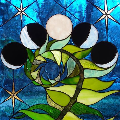 imagery of the fern and fiddlehead and the phases of the moon.  I loved making this special piece.  Happy Full Moon, friends!  #stainedglass #stainedglasswindow #moonphases #fullmoon #fern #fiddlehead #wildernessart #customart Neile Cooper, Fern Fiddlehead, Fern Stained Glass Pattern, Lunar Moth Stained Glass Pattern, Moon Phase Stained Glass Pattern, Stained Glass Luna Moth, Stained Glass Tropical Fish, Glass Cabin, Utah Vacation