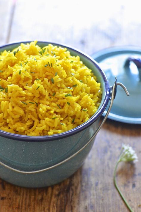 This easy yellow rice is flavored with turmeric and is ready in under 20 minutes #glutenfree #sidedish #healthy Easy Flavored Rice, Easy Yellow Rice, Flavored Rice Recipes, Yellow Rice Recipes, Turmeric Recipes, Flavored Rice, Yellow Rice, Side Recipes, Family Friendly Meals