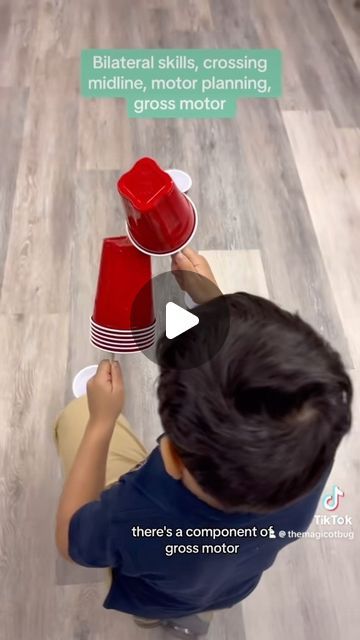 𝕋𝕙𝕖 𝕄𝕒𝕘𝕚𝕔 𝕆𝕋 𝔹𝕦𝕘 on Instagram: "📢This is one of my favorite activities!  📢All you need are cups and chopsticks! Watch the video to see how the activity works.   📢This activity addresses bilateral skills, balance, gross motor skills, motor planning, crossing midline, and following directions.   🔔Let me know if you try it!   #Schoolbasedoccupationaltherapy #coloringsheetsforkids #ot #cota #homeschoolingideas #pedsot #schoolbasedot #schoolbasedotresources #occupationaltherapyforkids #specialed #specialeducation #finemotorskills  #otforkids #otideas #pediatricoccupationaltherapist #tpt #teacherspayteachers" Midline Crossing Activities, Motor Planning Activities, Gross Motor Skills Activities, Coordination Activities, Occupational Therapy Kids, Bilateral Coordination, Gross Motor Activity, Motor Planning, Baby Toys Diy