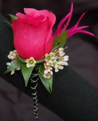 Fuschia Boutonniere, Hot Pink Prom Flowers, Hot Pink Corsage And Boutonniere, Hot Pink Wrist Corsage, Best Wedding Dresses Black, Hot Pink Boutonniere, Prom Boutineer, Prom Corsage Pink, Pink Rose Boutonniere