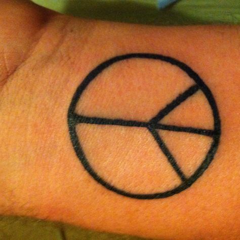 simple and perfect tattoo  very basic peace symbol  black tattoo  wrist tattoo Small Peace Sign Tattoo, Peace Sign Tattoo, Peace Sign Tattoos, Peace Tattoo, Peace Tattoos, Sign Tattoo, Mark Tattoo, Small Hand Tattoos, Symbol Tattoos