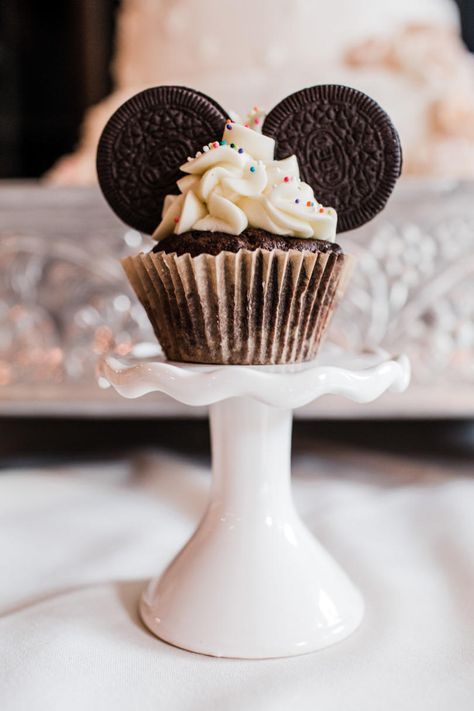 Everyone knows a Disney-fanatic bride. “Be our guest” to ooh and ah over the happiest party on earth filled with favorite movie quotes on table numbers and Mickey Mouse-shaped desserts. #southernliving #wedding #bridalshowers Bridal Shower Favors Disney, Disney Bridal Shower Decorations, Subtle Disney Bridal Shower Ideas, Disney Bridal Shower Favors, Bridal Shower Ideas Disney, Disney Wedding Cupcakes, Disney Winter Wedding, Disney Wedding Shower Ideas, Bridal Shower Disney Theme