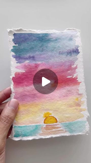 Tombow USA on Instagram: "Although I love using Tombow Dual Brush Pens for lettering, there’s just something so magical about using them for watercolor paintings! So let’s paint a watercolor sunset together using the Tombow Dual Brush Pen Art Markers, Tropical, 10-Pack!⁠ ⁠ Lay out all your colors on your Blending Palette. Here, I’m layout out: 685, 379, 985, 805, 856, 817⁠ ⁠ Draw a horizontal line for the horizon + a semi-circle for the sun.⁠ ⁠ Using a damp brush, paint the sky bottom up, starting with yellow, then reds/pinks, and then blue/purples.⁠ ⁠ While still damp, add in darker colors for some clouds.⁠ ⁠ Using 985, directly color in the sun and use a damp brush to blend it out.⁠ ⁠ Use any blue to paint the ocean and any yellow horizontal lines for the reflection of the sun on the wat Dual Marker Art, Tombow Dual Brush Pen Art, Paint The Ocean, Sunset Together, Brush Pen Art, Tombow Dual Brush Pen, Circle Painting, Tombow Dual Brush, Art Markers