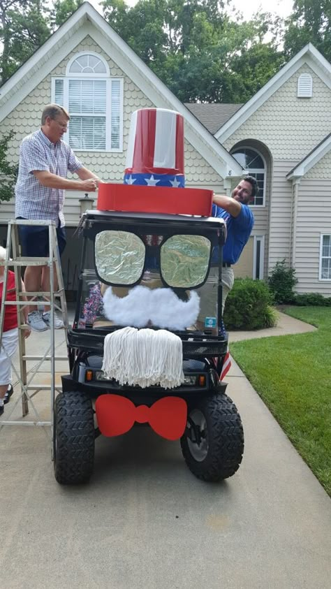 Uncle Sam golf cart parade decorating contest trash can hat black red white mop sunglasses mustache beard bow tie forth of July holiday blue Golf Cart Decorating Ideas Labor Day, Decorating Golf Cart For 4th Of July, Fourth Of July Golf Cart Decorations, Patriotic Golf Cart Decorations, Golf Cart Decorating Ideas Parade Floats, Golf Cart Decorating Ideas 4th Of July, 4th Of July Golf Cart Parade Ideas, 4th Of July Golf Cart, Golf Cart Parade