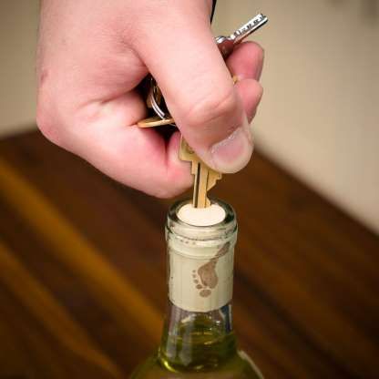 10 Ways to Open a Wine Bottle without a Corkscrew: Open Wine Bottle With a Key - Provided by The Family Handyman Open Bottle Without Opener, Wine Opener Hack, Open Wine Without Corkscrew, Wine Rack Towel Holder, Open Wine, Diy Wine Bottle, Wooden Wine Crates, Pallet Wine, Wooden Wine Boxes