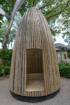 Huts demonstrate regional building techniques at the Finnish Pavilion Bamboo Building, Wooden Hut, Bamboo House Design, Bamboo Structure, Bamboo Architecture, Bamboo Construction, Bamboo Decor, Bamboo Art, Bamboo House