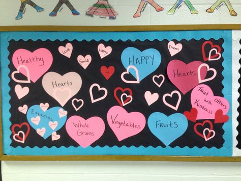 Heart Healthy Habits board "Valentine" themed Valentines Day Bulletin Board Ideas, Valentine Bulletin Board, Cafeteria Bulletin Boards, Pizza Valentine, Nurse Bulletin Board, February Bulletin Boards, School Nurse Office Decorations, Health Bulletin Boards, Food Bulletin Boards