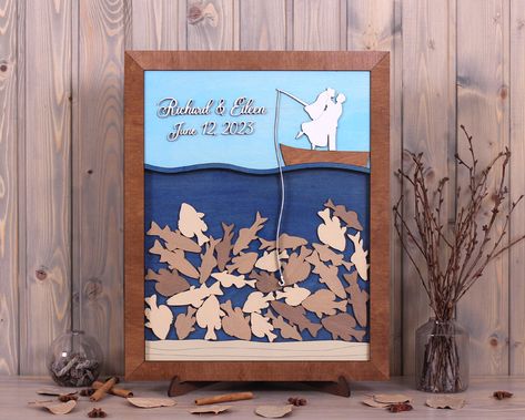 Wedding Drop box Couple on a Boat Custom frame 3d Wood drop river wedding ideas river Fishing Wood Custom frame 3d Unique wedding sign This drop box wedding guestbook, a beautiful guest book alternative that is fun for you and your guest. Your guests sign and drop the pieces into the frame and then you can actually hang it in your home to enjoy for years to come. You will always remember who shared in your wedding day with you and spouse. We are happy to customize the colors of the guest book fo Fishing Engagement Party, Fishing Wedding Ideas, River Wedding Ideas, Couple On A Boat, Fishing Themed Wedding, Wedding Secrets, Heather Wedding, Unique Wedding Signs, Wedding Drop Box