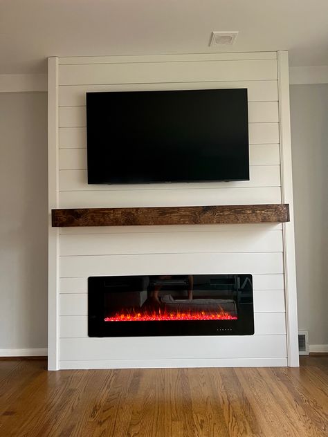 Shiplapped Tv Wall, White Shiplap Walls Living Room Tv, Shiplap Fireplace With Electric Insert, Shiplap Entertainment Wall Living Room, Living Room Shiplap Fireplace, Shiplap Fireplace Wall With Wood Mantle, Tv Fireplace Wall Ideas Built Ins Shiplap, White Shiplap Fireplace With Wood Mantle, Shiplap Fireplace Tv Wall