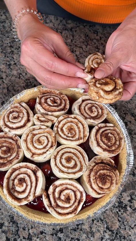 this dessert is so easy and yummy! | dessert, cherry, cinnamon roll, recipe | this dessert is so easy and yummy! this is a simple recipe to make a yummy cherry pie using canned cherries and cinnamon rolls! | By Kristin's Friends | Facebook | Alright, y'all. We definitely need two cans of cherries here and today, I bought ooh that that gel is flying around. Today, I bought, I want to try something different. So, I bought this simply pie filling where it's it's a little bit more natural and healt Cherry Pie Filling And Cinnamon Rolls, Cherry Pie Cinnamon Rolls, Cherry Cinnamon Rolls Simple, Cinnamon Rolls And Cherry Pie Filling, Cinnamon Roll Cherry Pie Filling, Easy Cherry Pie From Can, Kristen's Friends Recipes, Canned Cherry Pie Filling Recipes Easy, Kristin's Friends Recipes