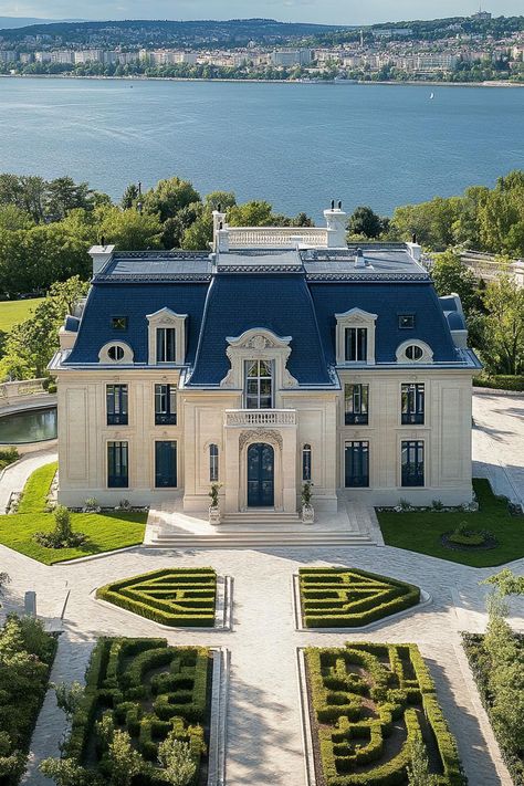 High angle view of a modern french mansion with dark blue roof ornate facade front garden with chrub maze marble pathways big river in the. Let’s reveal the charming features, quirky details, and luxurious elegance of French mansions. Rich Houses Dream Homes Luxury Mansions, Billionaire Houses Mansions, French Villa Exterior, Modern French Mansion, Modern French Country Exterior, French Chateau Exterior, Villa House Design, Aesthetic House Exterior, French Villa Interior