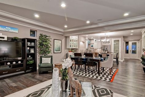 grey-hardwood-floors-ideas-warm-gray-floor-modern-living-room-dining-room-open-floor-plan Open Concept Ideas, Gray Wood Flooring, Oakwood Homes, Grey Hardwood Floors, Floors Ideas, Grey Hardwood, Wood Floor Design, Gray Floor, Grey Wood Floors