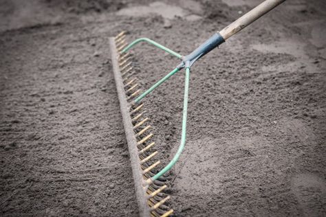 How to Install a Paver Walkway on a Slope | DoItYourself.com Pavers On A Slope, Walkway On A Slope, Reseeding Lawn, Paver Installation, How To Install Pavers, Seeding Lawn, Walkway Landscaping, Paver Walkway, Garden Walkway