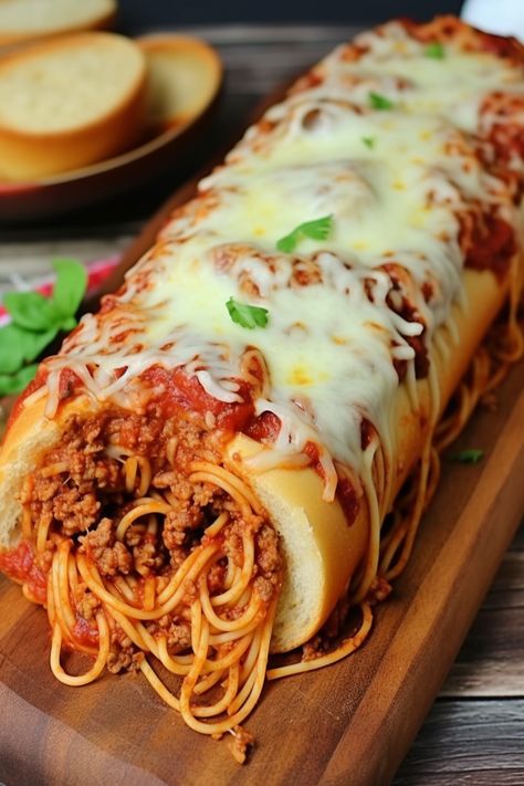 Spaghetti-Filled Garlic Bread - An Organized Chaos Spaghetti Boats, Sausage Meat Sauce, Spaghetti Stuffed Garlic Bread, Cheesy Baked Asparagus, Spaghetti Bread, Cheesy Baked Spaghetti, Stuffed Garlic Bread, Cherry Pie Bars, Asparagus Casserole