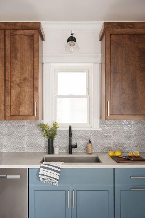 Blue painted lower kitchen cabinets with wood upper cabinets and light gray quartz countertop. Two Tone Kitchen Cabinets, Two Tone Cabinets, Upper Kitchen Cabinets, Blue Kitchen Cabinets, Two Tone Kitchen, Brown Kitchens, Wood Kitchen Cabinets, Blue Cabinets, Low Cabinet