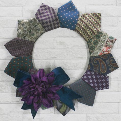 This Handmade Wreath Is Essential For Anyone That Loves Eclectic Re-Imagined Looks Repurposed Colorful Men's Silk Neckties Into Colorful Home Decor My Version Of Sustainable Fashion By Reusing Items For A New Look This Hanging Wall Art Is Made With 14 Different Silk And Polyester Neck Ties Beautiful Shades Of Green, Teal, Purple, Pink, Silver, Blue Large Purple Faux Flower With Black Glitter Edges Teal Velvet Bow Combination Of Print Patterns Including Stripes, Paisley, Geometric, Mandala, Flora Mens Ties Repurposed, Crafts With Ties, Neck Tie Projects, Old Neck Ties, Necktie Quilts, Necktie Projects, Diy Necktie Projects, Tie Projects, Denim Wreaths