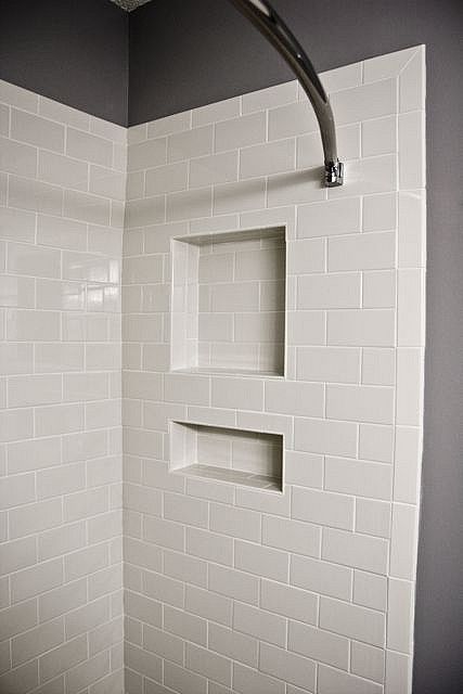 White subway tile featuring shower niche and bullnose edge tile. Also subway tiles turned vertical on outside edges. Subway Tile Shower Niche, White Subway Tile Shower, Tile Shower Niche, White Subway Tile Bathroom, Makeover Kamar Mandi, White Tile Shower, Subway Tile Showers, Subway Tiles Bathroom, Bad Inspiration