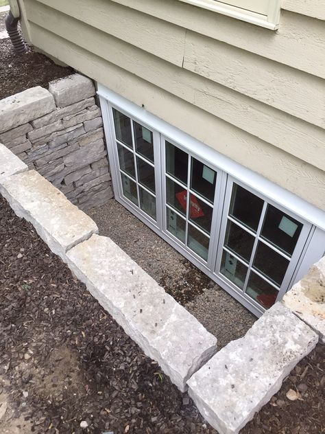 fond du lac wall stone Affordable Egress Windows & Basement Waterproofing LLC. 763-443-0555 Stone Window Well, Egress Window Front Of House, Stone Egress Window Well, Egress Window Ideas Basement, Egress Window Landscaping, Egress Window Well, Basement Window Well, Dry Basement, Basement Entrance