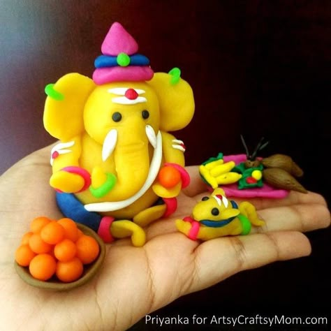 How to Make Clay Ganesha at Home - Ganesh Chaturthi Crafts and Activities to do with Kids - Make a Clay Ganesha, decorate, Ganesha's throne & umbrella, rangoli ideas, recipes, books and more Ganesh Making, Clay Art For Kids, Activities To Do With Kids, Clay Ganesha, Ganesh Chaturthi Decoration, Clay Crafts For Kids, Happy Ganesh Chaturthi Images, Kids Clay, Baby Ganesha