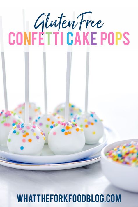 This Gluten Free Confetti Cake Pop recipe from What the Fork is so easy to make thanks to using a shortcut - gluten free cake mix! These are classic birthday cake pops with vanilla and sprinkles and topped with white chocolate. Follow this cake pop tutorial and you’ll learn how to make cake pops like a pro! This is such a fun, healthier birthday treat and tradition. Sponsored by @kingarthurbaking