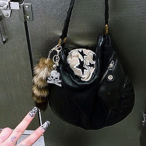 y2k bag purse skull raccoon keychain / maybematea on ig Raccoon Tail Accessory, Raccoon Tail Keychain, Emo Bag, Raccoon Keychain, 2000s Bags, Raccoon Tail, Y2k Bags, Punk Style Outfits, Y2k Purse