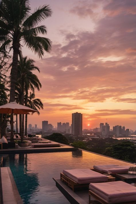 A hyperrealistic POV of a person lounging in a rooftop infinity pool, watching the vibrant orange and pink sunset over a sprawling cityscape. The sky glows intensely while the city lights start to sparkle below, offering a mix of urban excitement and peaceful relaxation—captured in stunning, lifelike detail for the ultimate escape. City Lights Sunset, Rooftop Infinity Pool, Pool Sunset, Philippines Destinations, Sky Pool, Business Hotel, Too Real, Rooftop Pool, Beautiful Travel