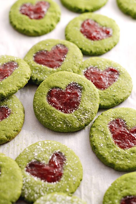 Soft and tender matcha thumbprint cookies filled with strawberry jam. They're one of the easiest holiday cookies you can make for a matcha lover! #matcha #holidaycookies #thumbprintcookies #cookies | teakandthyme.com Matcha Raspberry Cookies, Mushroom Thumbprint Cookies, Matcha Thumbprint Cookies, Strawberry Matcha Dessert, Christmas Jam Cookies, Red And Green Cookies, Strawberry Matcha Cookies, Matcha Baked Goods, Tomato Cookies