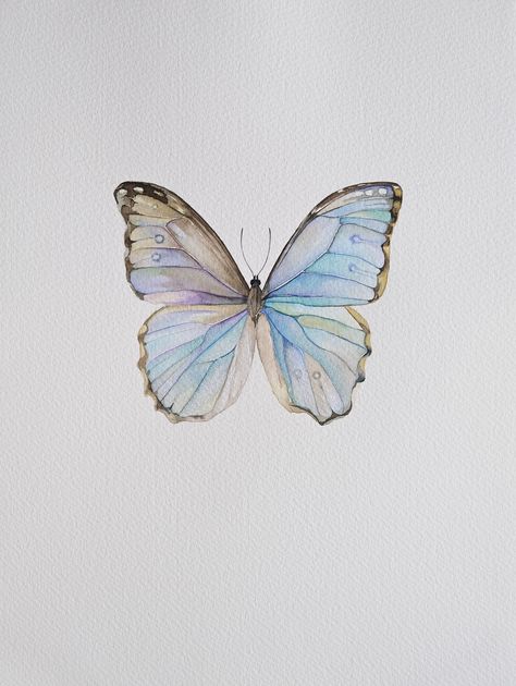 High-Quality Botanical Watercolor Art - Morpho Butterfly Discover the delicate beauty of this Morpho Butterfly watercolor artwork. Created by a professional artist, this piece showcases vibrant colors and intricate details on high-quality, tactile paper using premium paints. Perfect for adding a touch of nature to any space, this original artwork is ideal for home or office decor.  * Original watercolor painting  * High-quality materials: premium paper and bright quality paints  * Vibrant and de Watercolor Painting Butterfly, Butterfly Digital Art, Butterfly Watercolor Painting, Illustration Butterfly, Bedroom Paintings, Pretty Butterflies, Book Scrapbook, Design Sheet, Watercolor Butterfly