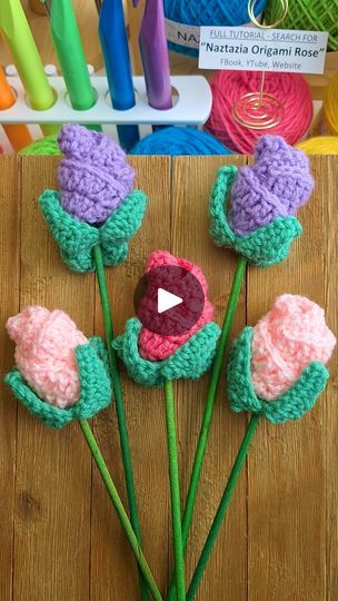 885K views · 8.3K reactions | This crochet origami rose is made in the round with yarn and double crochet stitches. Then this circle is rolled and cuffed into a rose bud shape and added to a stem. #reels #crochet #knitting #roses #origami #yarn #makersgonnamake #tutorial #3d #flowers #naztazia | Naztazia | Naztazia · Original audio Crochet Flowers 3d, Crochet Rolled Flower, Crochet Round Flower Pattern, Africa Flowers, Crochet Origami, Crochet Rose With Stem, 3d Rose Granny Square, Arm Knitting Scarf, Knitting Scarf