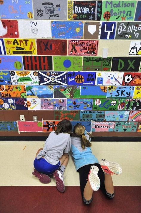 Rylee Arney, left, and Skylar Zettle paint their bricks on the wall May 20, 2015. Penns Valley Area Elementary School has a long standing tradition that sixth-grade students get to paint a brick in the cafeteria. The walls in the cafeteria are covered with colorful painted bricks from students over the years. Senior Brick Wall Painting Ideas, Bloomsburg University, Painted Bricks, Science Images, Drawing Now, Aerospace Engineering, Painted Brick, Brick Design, Sixth Grade