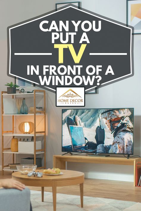 Tv Covering Window, Bay Window Tv Ideas, Tv In From Of Window, Tv Below Window, Tv Near Window Living Rooms, Corner Tv Between Windows, Tv Stand In Front Of Window Living Room, Tv With Windows Behind, Tv In Front Of Windows Living Room