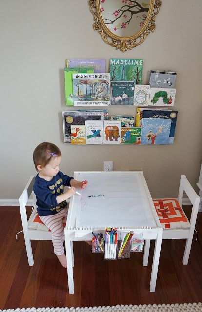 art table (an Ikea LATT hack) $20 table and chairs  Acrylic book shelves 24 inch $8 each buy 3 for under window Latt Hack, Colored Pencil Storage, Ikea Kids Playroom, Diy Kids Chair, Ikea Latt, Kids Art Table, Ideas Habitaciones, Toddler Table, Ikea Kids