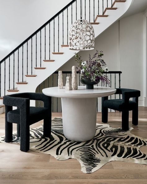 CB2 on Instagram: “when your dining table can double as an entry table and vice versa 🙌” Round Concrete Dining Table, Tattoo Modern, Zebra Hide, Fabric Lounge Chair, Concrete Dining Table, Black Chair, Meridian Furniture, Entry Table, Table Seating