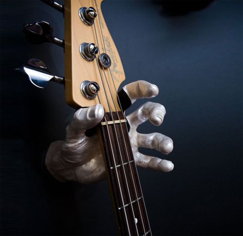 The hand guitar wall holder is a guitar holder that is shaped like a hand that you can attach to your wall and hang your guitar to it. Stop setting your guitar down on the floor or a stand like some s... Guitar Wall Holder, Ridiculous Gifts, Unusual Gadgets, Relax Room, Guitar Holder, Guitar Wall Hanger, Music Rooms, Grand Pianos, Guitar Rack