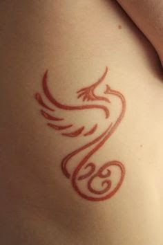 33 Minimalist Phoenix Tattoo Ideas: The Phoenix is a symbol of a third-stage Scorpio. These Scorpios exercise power through love,  healing and transformation. The Phoenix represents a Scorpio who has been transformed, and has reached deep within him/herself to embrace the more subtle, mystical qualities of the soul, rather than ones ego, and in result soar to spiritual heights like a bird on the wing. Simple Phoenix Tattoo, Brown Tattoo Ink, Small Phoenix Tattoos, Phönix Tattoo, Phoenix Tattoo Design, Phoenix Tattoo, Get A Tattoo, Love Tattoos, Pretty Tattoos