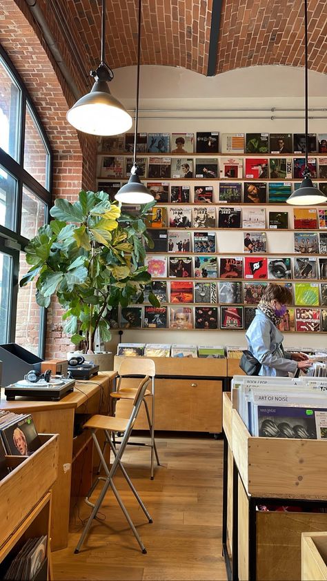 Vintage Music Store Aesthetic, Record Shop Interior Design, Vinyl Records Coffee Shop, Record Shop Interior, Coffee Shop Room Aesthetic, Industrial Interior Aesthetic, Art And Coffee Shop, Book And Coffee Shop Aesthetic, Music Cafe Design