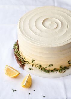 Lemon thyme cake with lemon curd buttercream and thyme syrup Lemon Thyme Cake, Thyme Cake, Lemon Curd Dessert, Cake With Lemon Curd, Lemon Thyme, Smitten Kitchen, Cake Fillings, Savoury Cake, White Cake