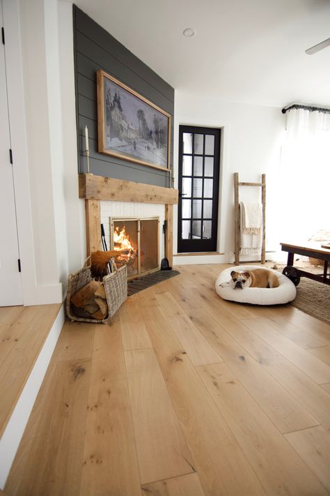 Light Wood Floors White Walls Black Accents, Dark Wood Floors White Walls, White Oak Vinyl Plank Flooring, Black Shiplap Fireplace, Golden Oak Floors, Natural Modern Interior, Black Brick Fireplace, Staining Wood Floors, Dark Oak Flooring