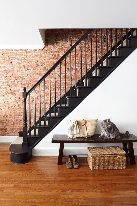 Stairwell with exposed brick wall. Black painted treads, risers, and railing. Exposed Brick Bedroom Wall, Exposed Brick Interior Wall, Brick Staircase Wall, Exposed Brick Stairwell, Brick Wall Stairs, Staircase Brick Wall, Exposed Brick Staircase, Brick Stairs Interior, Exposed Brick Hallway