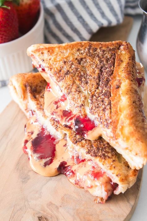 Peanut Butter and Jelly French Toast - This Little Home of Mine Peanut Butter Slice, Jelly Slice, French Toast Sandwich, Morning Breakfast, Egg Whisk, Slice Of Bread, Melted Butter, Jelly, Peanut