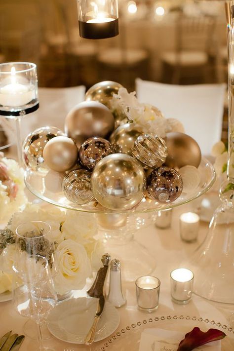 Ornaments at a winter wedding make a chic centerpiece that's also inexpensive. Glam Wedding Centerpieces, Winter Wedding Centerpieces, New Years Wedding, Deco Table Noel, Nye Wedding, New Years Eve Weddings, Winter Wonderland Wedding, Wedding Winter, 50th Wedding Anniversary