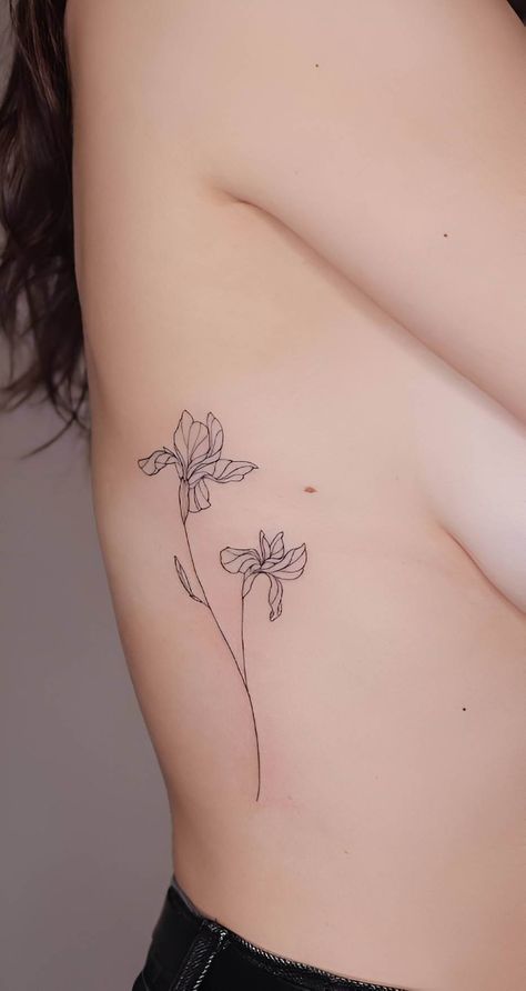 15 Breathtaking Iris Tattoo Designs For Lovely Ladies Fineline Iris Tattoo, Dainty Iris Tattoo, Iris Tattoo Fine Line, Fine Line Iris Tattoo, Feb Birth Flower Tattoo, Simple Iris Tattoo, Iris Tattoo Design, Flower Outline Tattoo, Iris Flower Tattoo