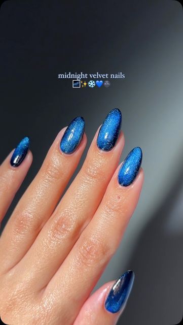 Kristin Kuyper 🤍 on Instagram: "🌌🌌🌌 • @gelcare.official  Patent Leather Black Midnight Velvet Sapphire  • • • #nails #almondnails #bluenails #winternails #gelnails #naturalnails #gelcare #nailinspo #nailtutorials" Midnight Nails Taylor Swift, Blue Velvet Nails, Navy Chrome Nails, Dark Blue Chrome Nails, Sapphire Blue Nails, Blue Cat Eye Nails, Sapphire Nails, Blue Chrome Nails, Velvet Nails