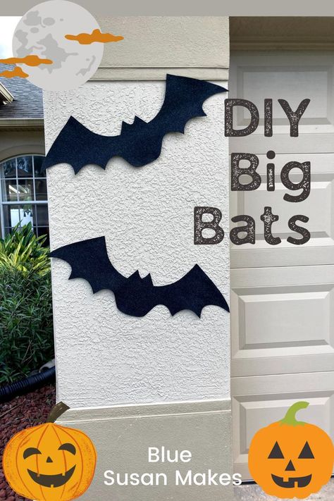 Large bat shapes decorate the garage for Halloween Outdoor Bats Diy, Halloween Bat Decorations Outdoor, Homemade Bats Halloween, Diy Halloween Bats Outdoor, Homemade Bat Decoration, Outdoor Bats Halloween, Diy Bats Halloween, Bat Diy Decoration, Diy Bats Decoration